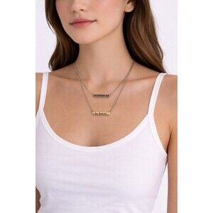 Anthropologie double silver adjustable necklace with bar that says be brave